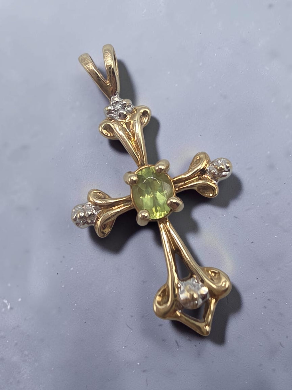 Solid 10K Yellow Gold Oval Peridot Cross Pendant with Diamond Accent