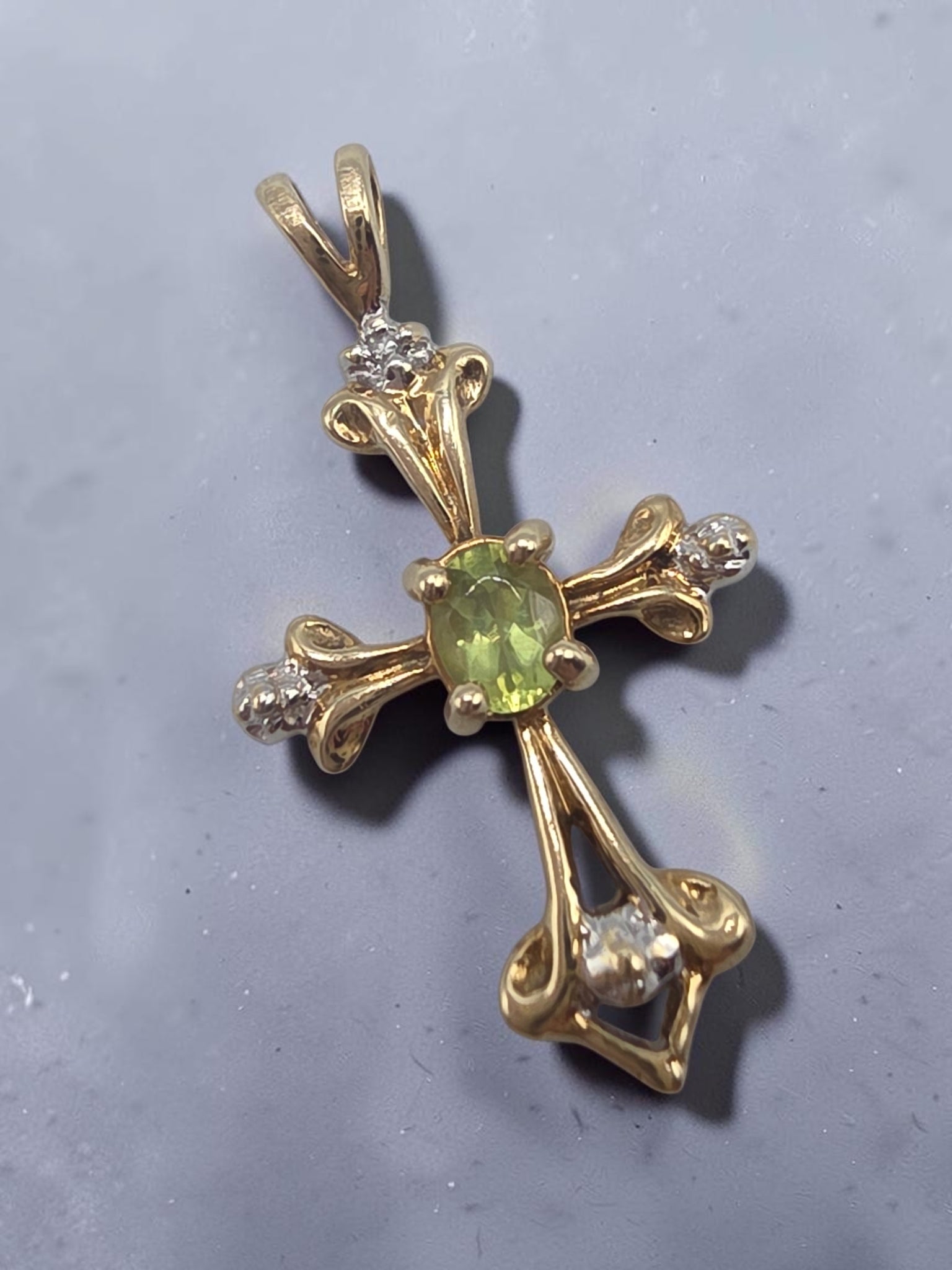 Solid 10K Yellow Gold Oval Peridot Cross Pendant with Diamond Accent