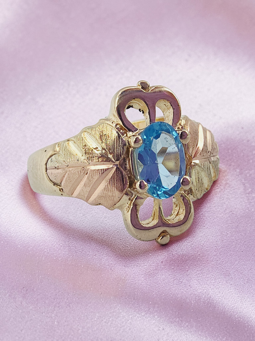 Black Hills Gold Solid 10K Ring with Oval-Cut Blue Topaz – Size 4.75