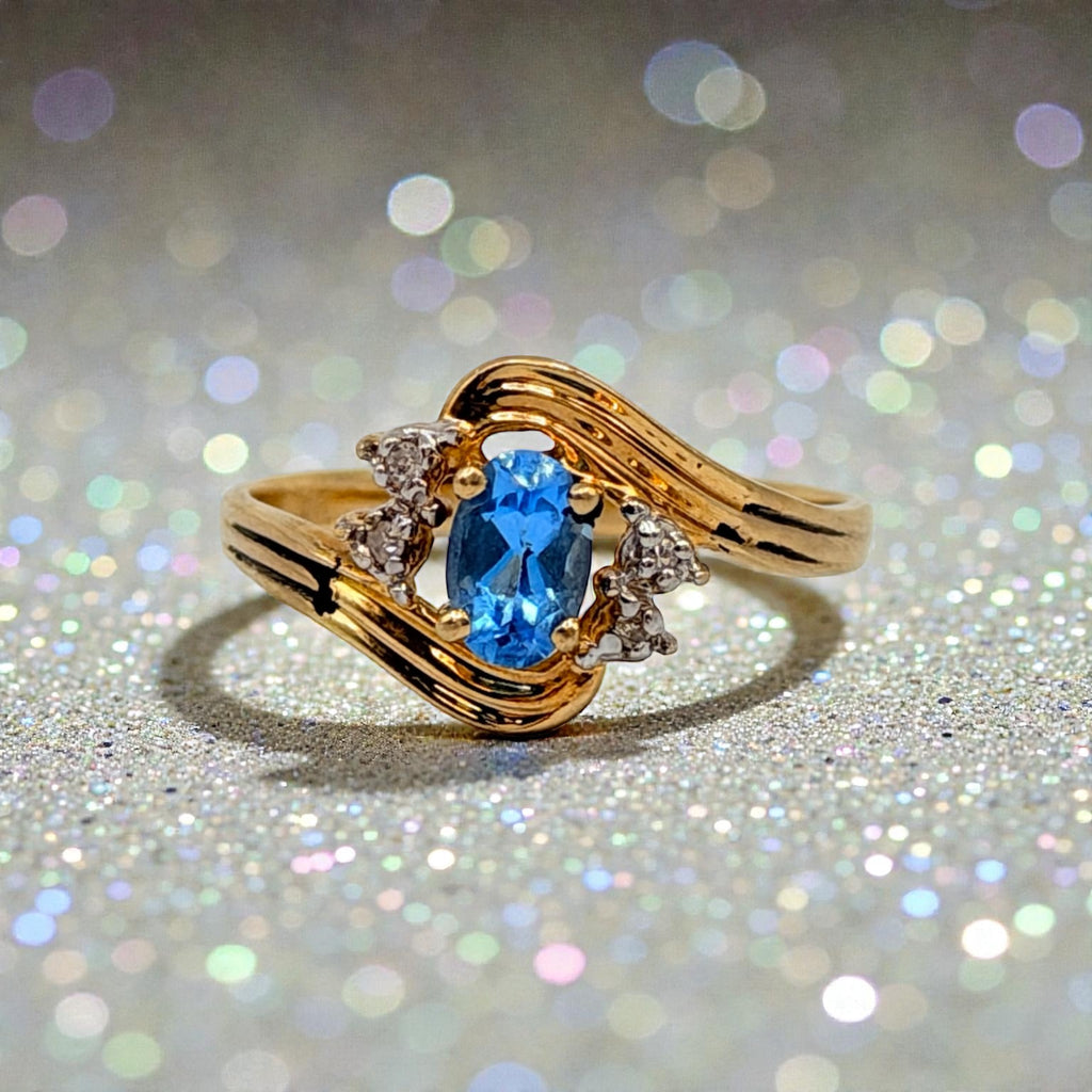 Solid 10K Yellow Gold Ring with Oval Cut Blue Topaz and Diamond Accents Size 7