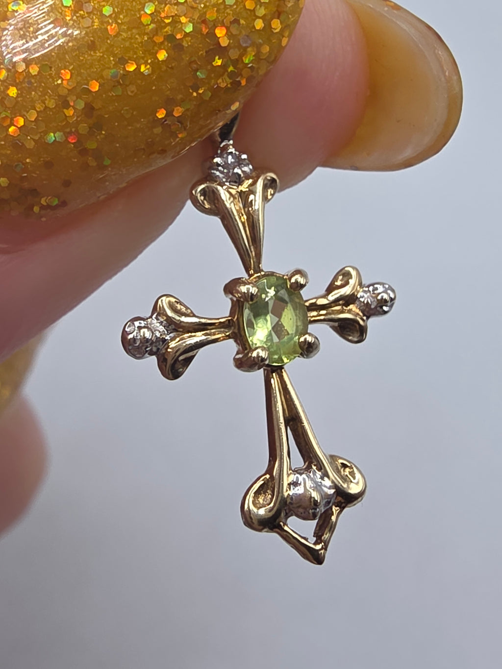 Solid 10K Yellow Gold Oval Peridot Cross Pendant with Diamond Accent